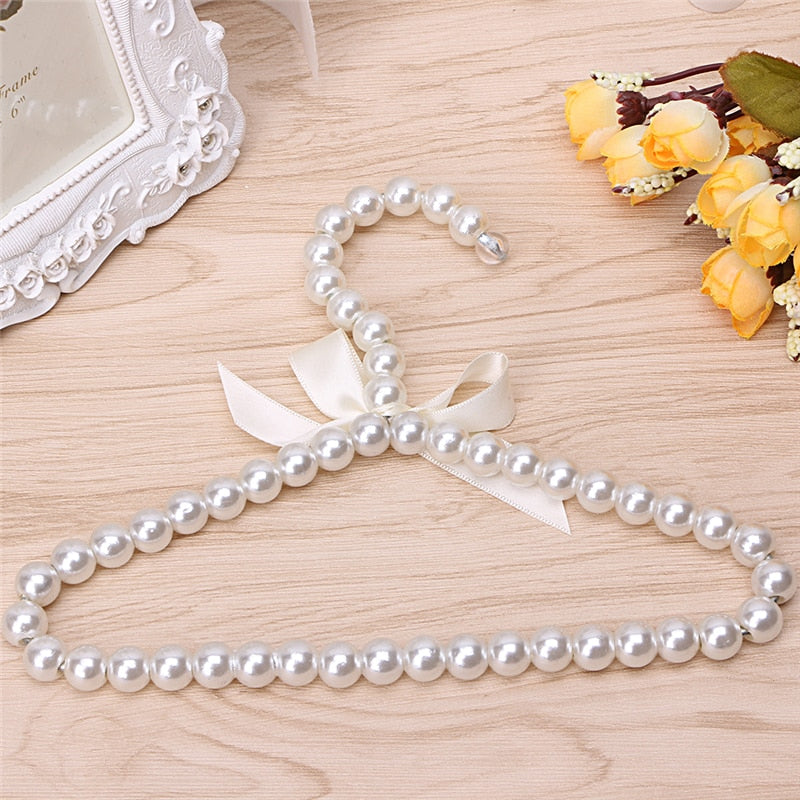 Plastic Pearl Bow Clothing Hanger