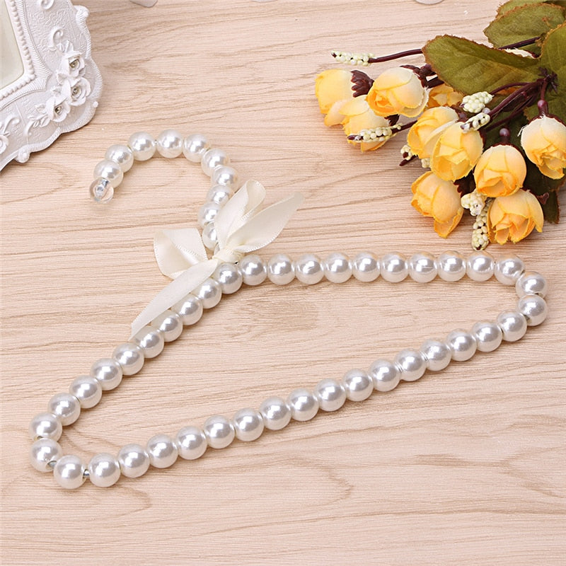 Plastic Pearl Bow Clothing Hanger