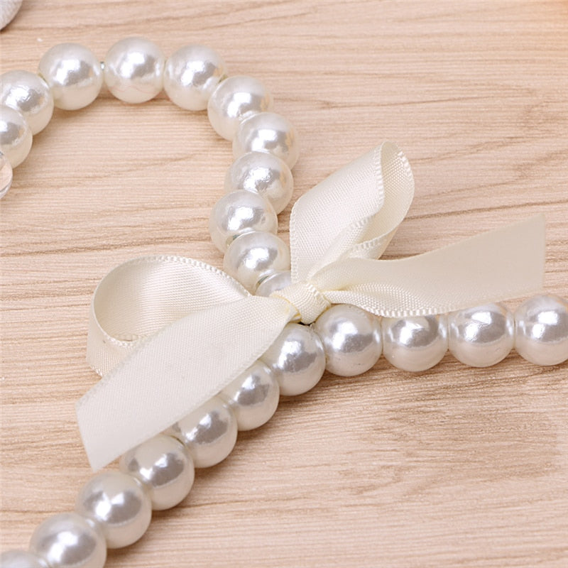 Plastic Pearl Bow Clothing Hanger