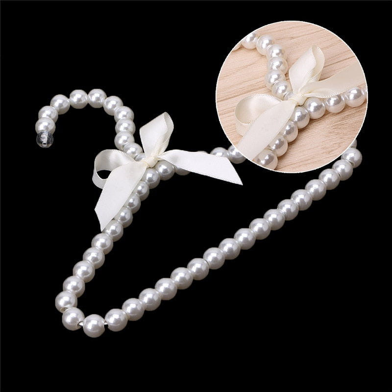 Plastic Pearl Bow Clothing Hanger